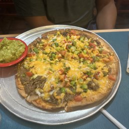 Mi Patio signature dishes Cheese Enchilada
Chicken Burro
Mexican Pizza